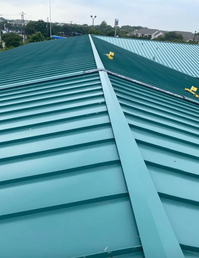 Green commercial metal roof ridge and valley for Metal Roof Repair in Fort Mohave
